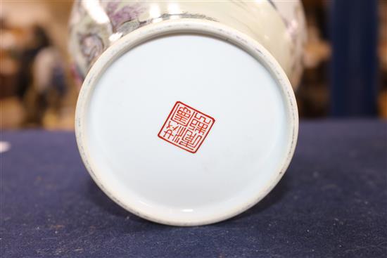 A Chinese famille rose baluster shaped vase, 20th century, height 33cm, wood stand